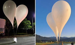 Kuzey Kore'den Güney Kore'ye balonların içinden çıkanlar pes dedirtti!